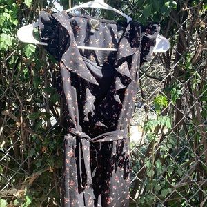 a black dress with pink and white flowers